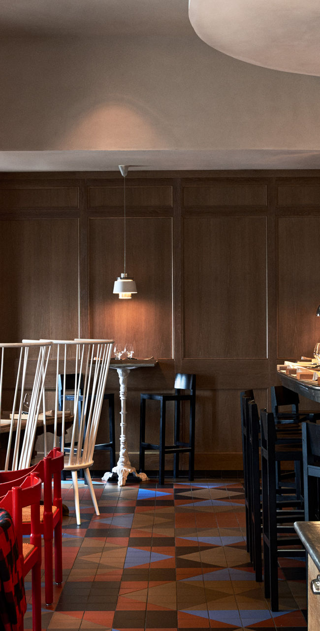 Modern restaurant interior with red accents