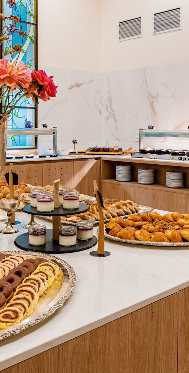 Elegant breakfast buffet in bright dining hall