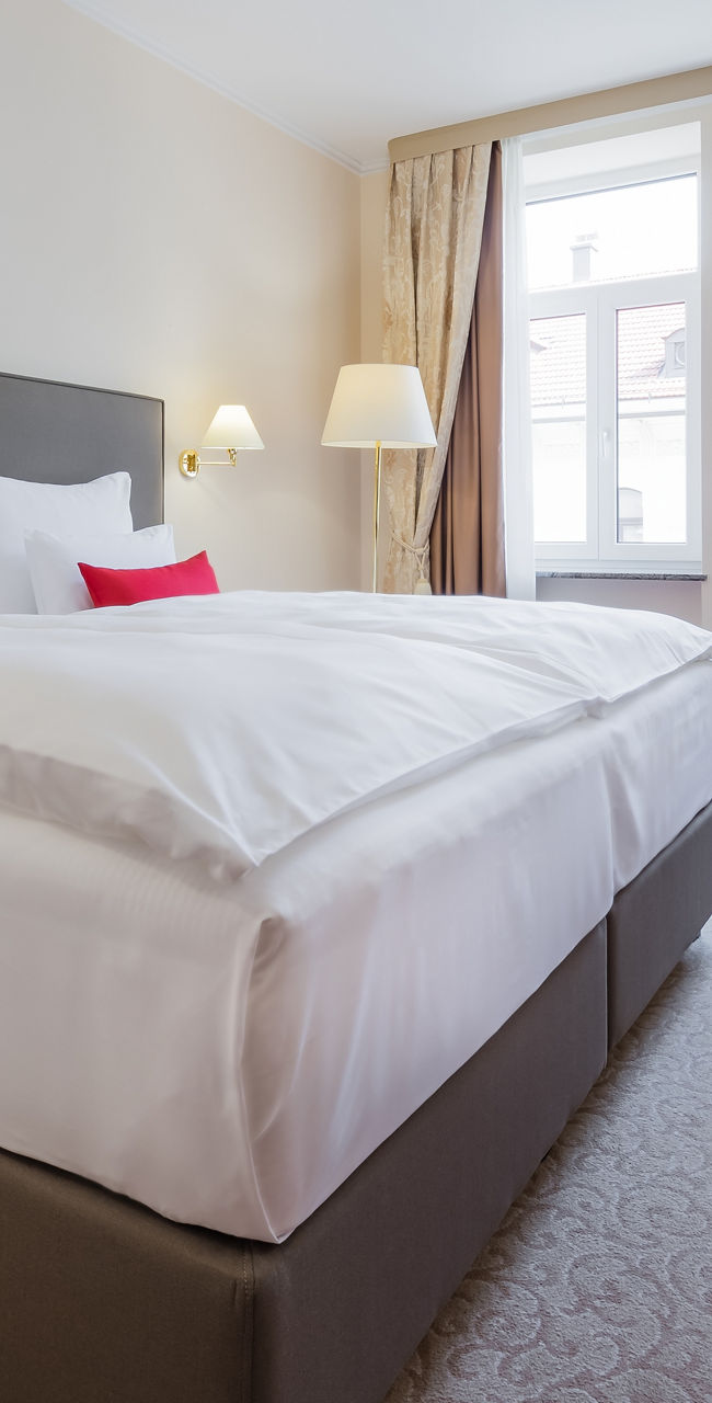 Modern hotel room with double bed