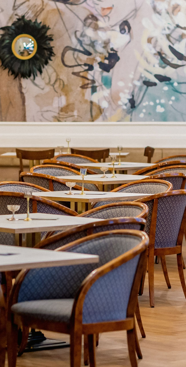 Elegant cafe interior with artistic mural