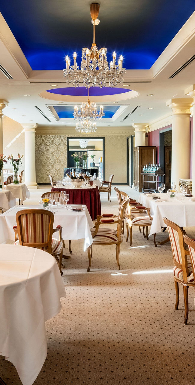 Elegant restaurant interior with chandeliers