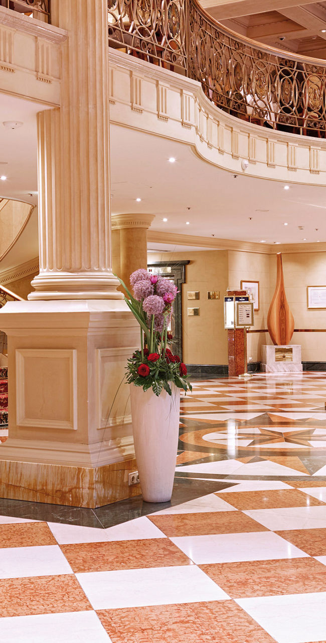 Elegant hotel lobby with grand staircase