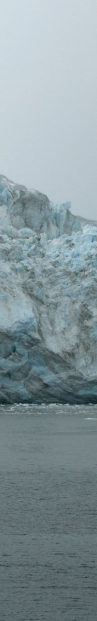 Majestic glacier meeting calm waters
