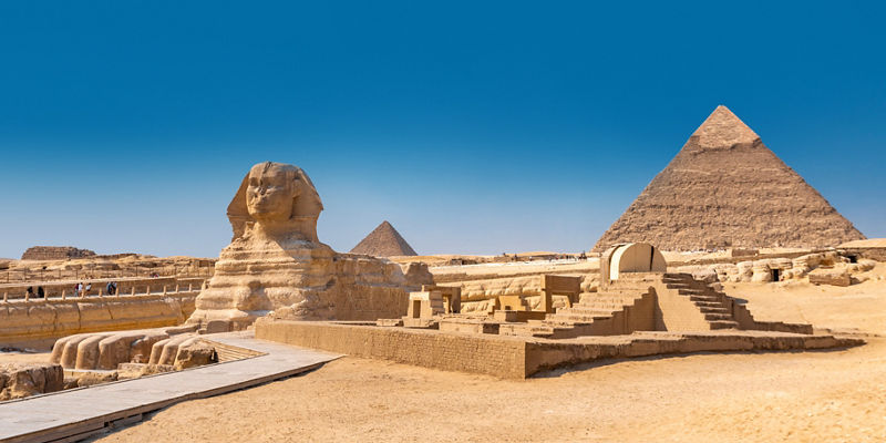 Great Sphinx and Pyramids under clear sky