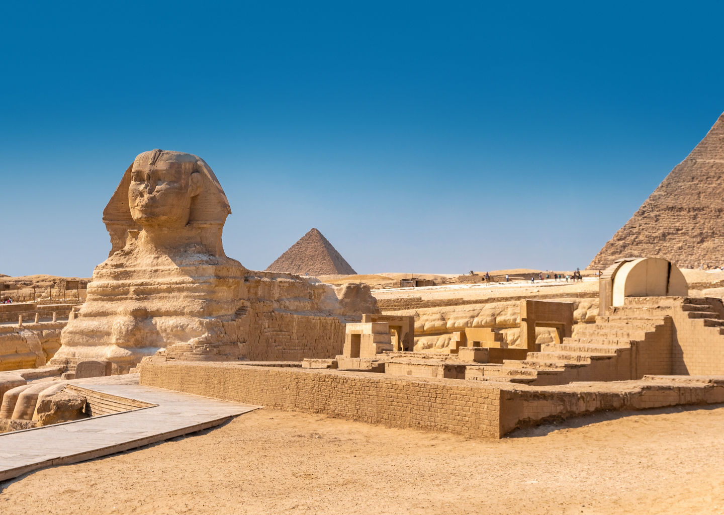 Great Sphinx and Pyramids under clear sky