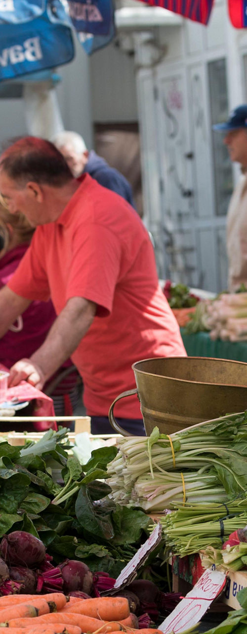 Outdoor farmers market with fresh produce