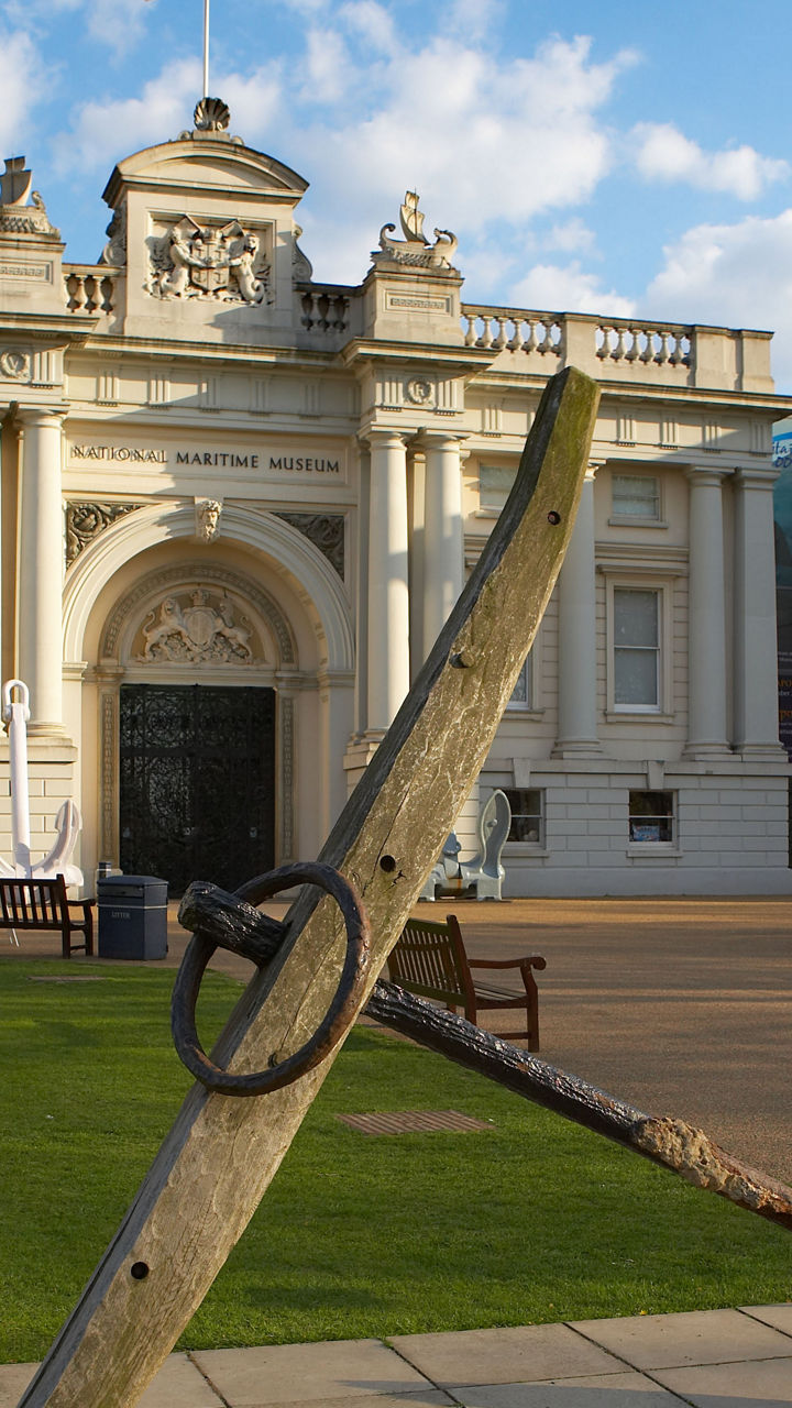 Historic maritime anchor outside grand building