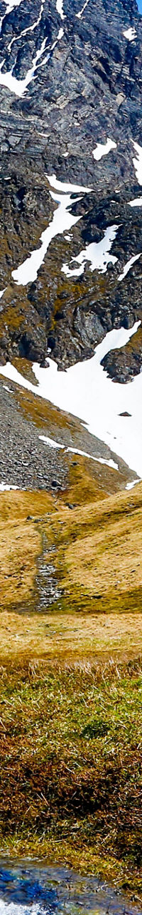 Scenic church in snowy mountain valley