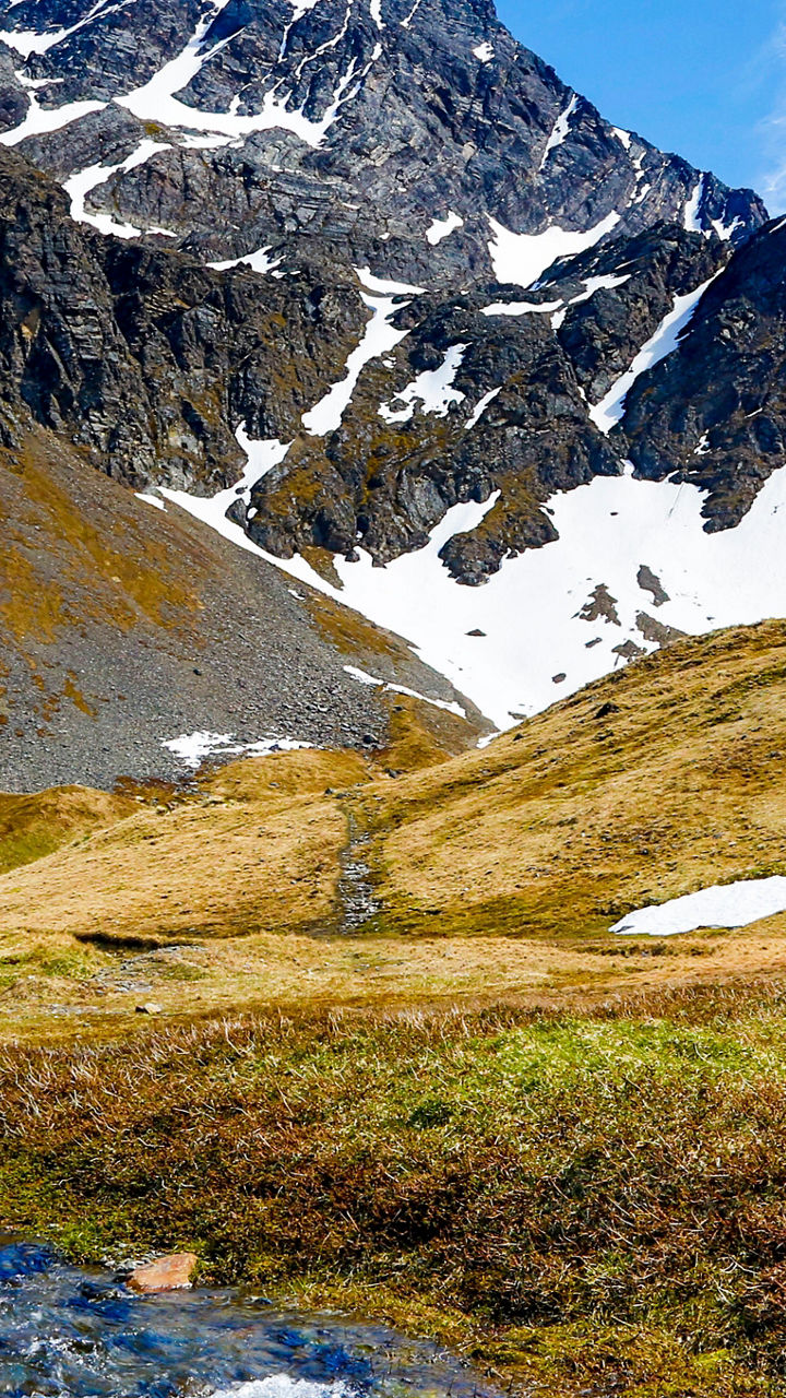 Scenic church in snowy mountain valley