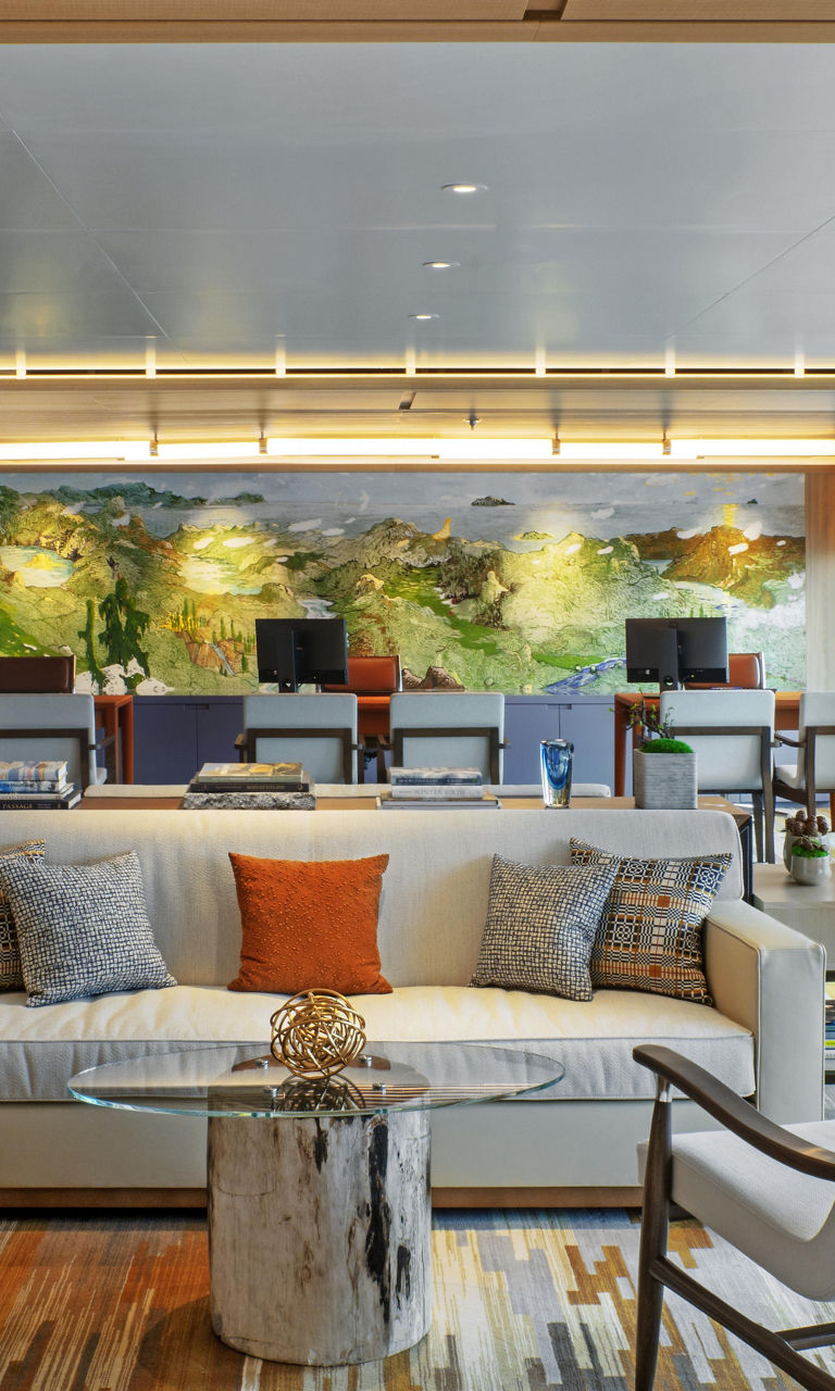 Modern lounge with scenic wall art