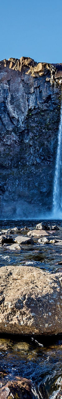 Scenic waterfall in rocky mountain landscape