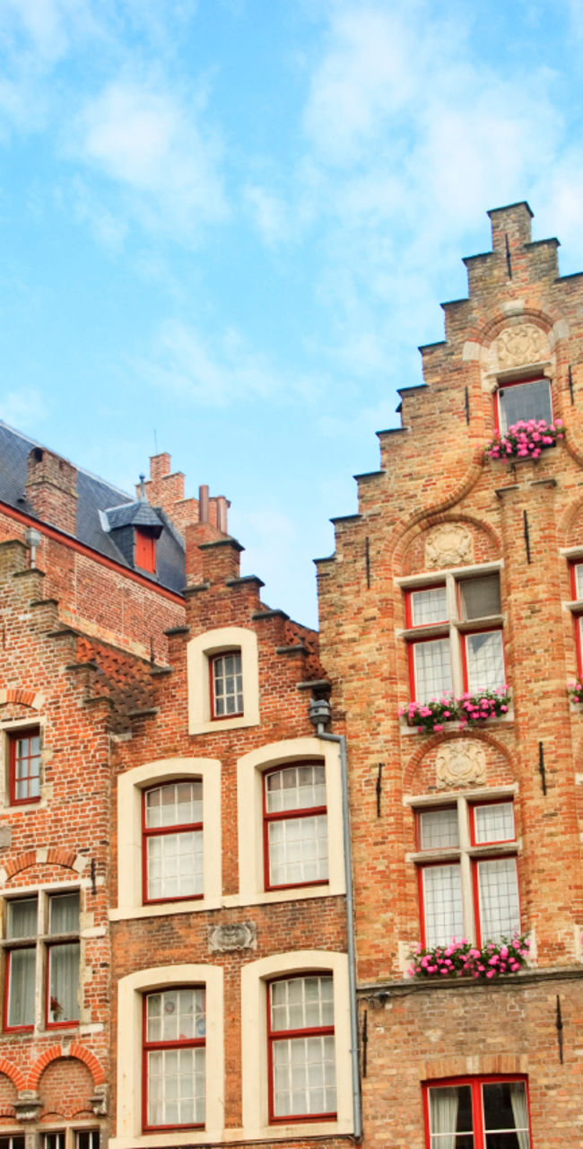 Colorful historic buildings in Bruges square