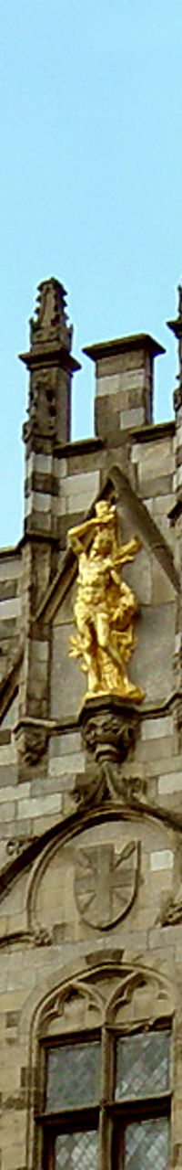 Historic European architecture with golden statues
