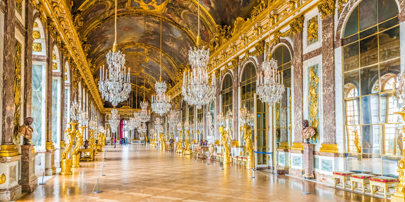 Ornate Hall with Chandeliers and Mirrors