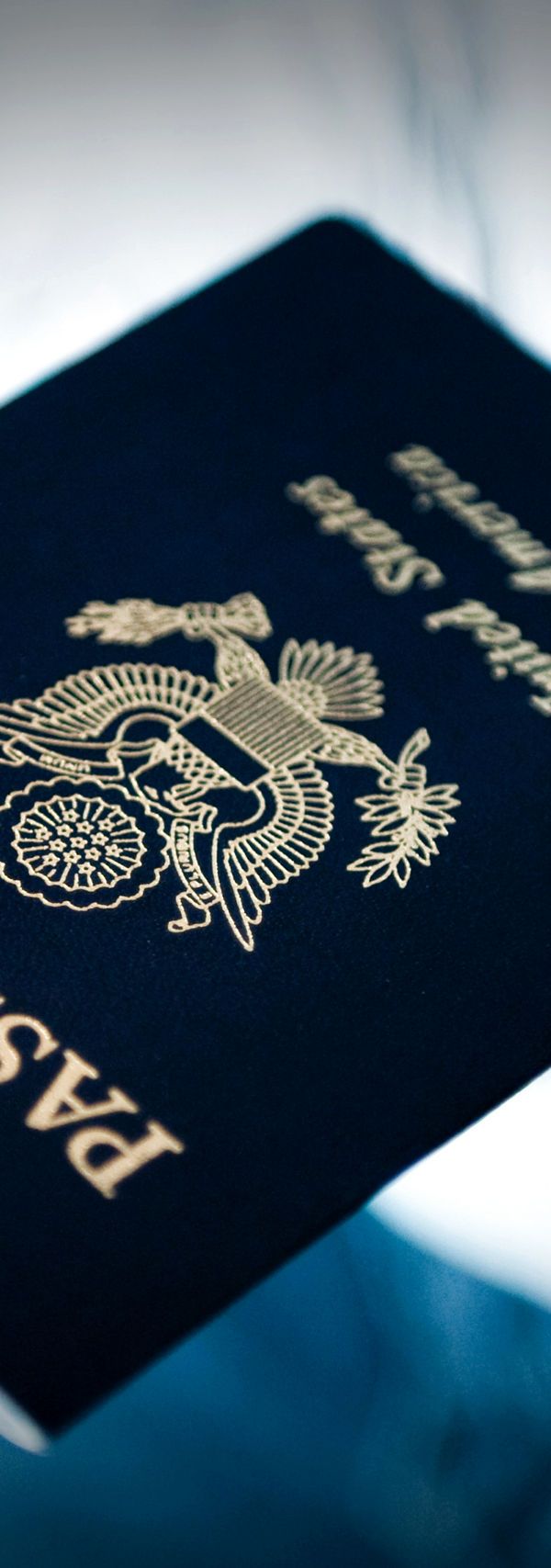 Close-up of a U.S. passport in hand