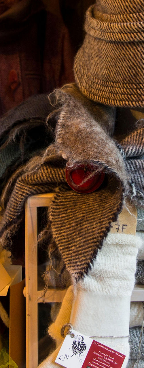 Cozy winter apparel in rustic shop