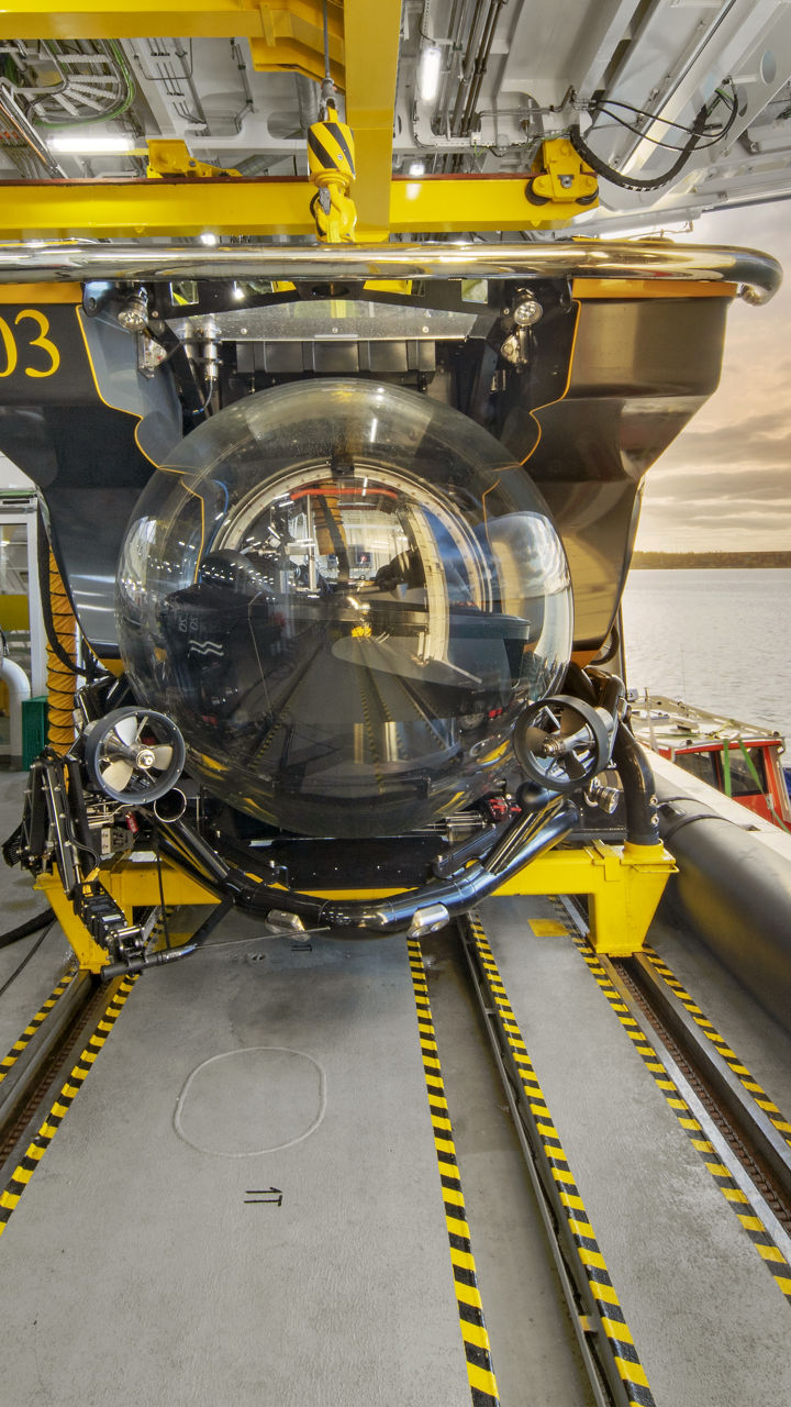 Submarine in docking bay with ocean view