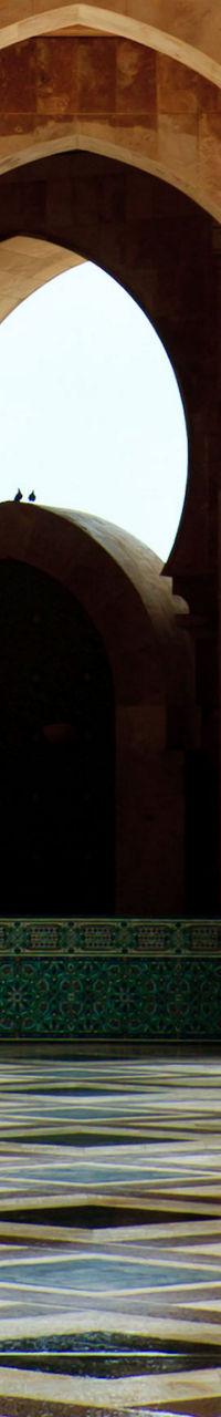 Elegant mosque corridor with intricate arches