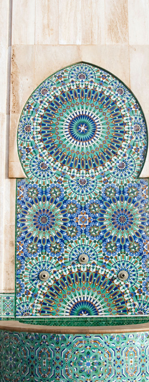 Ornate mosaic fountain in Moroccan architecture