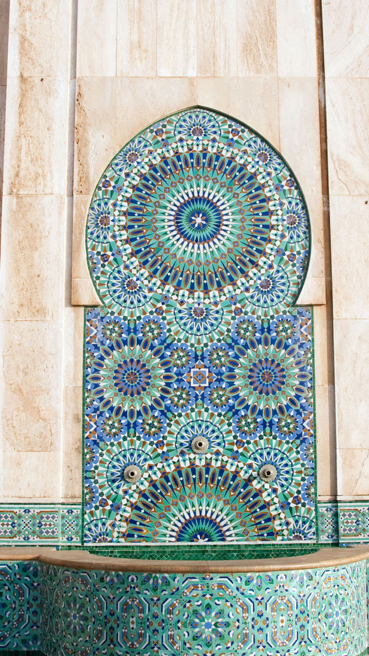 Ornate mosaic fountain in Moroccan architecture