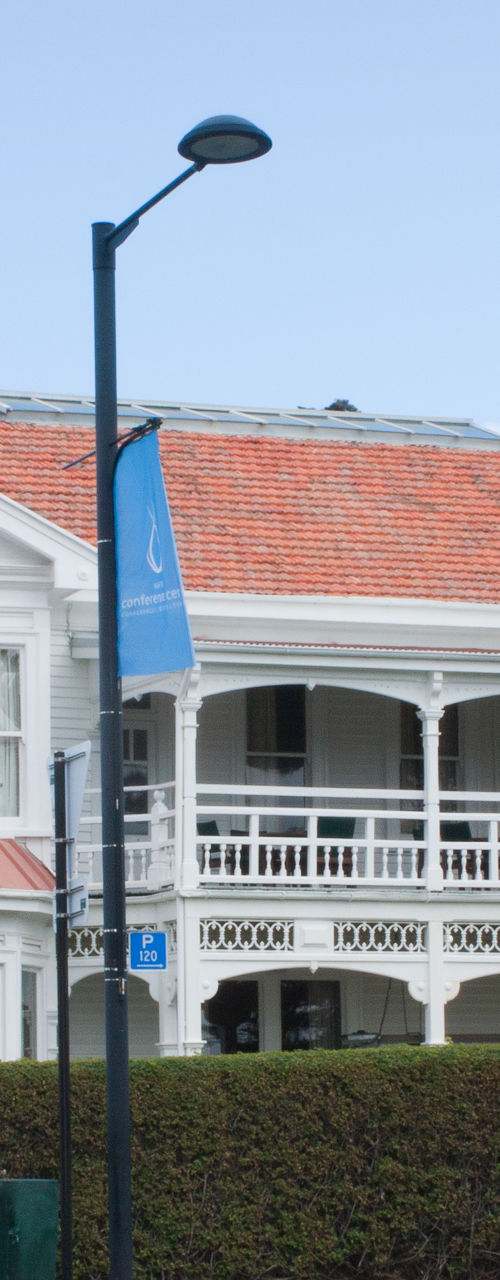 Colonial-style white building with red roof