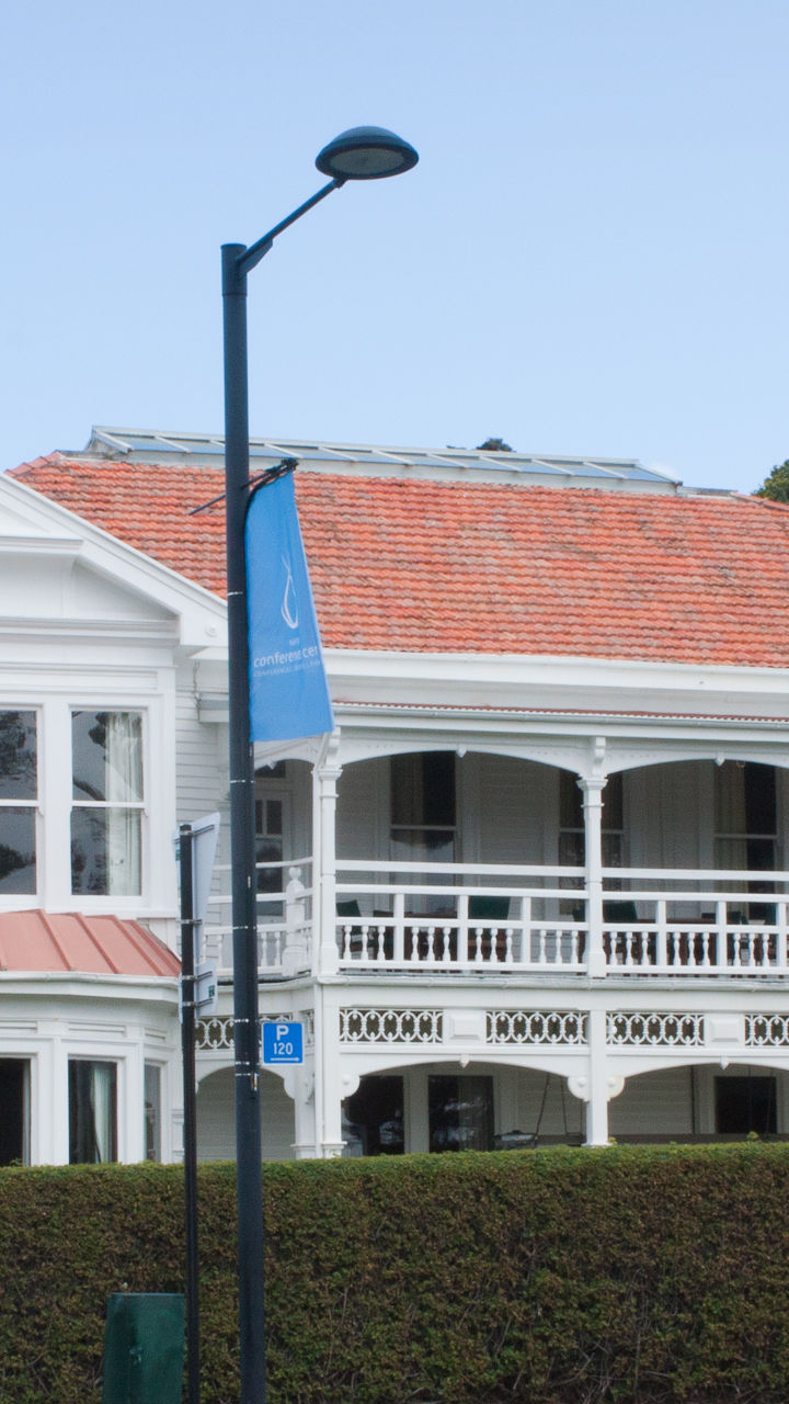 Colonial-style white building with red roof