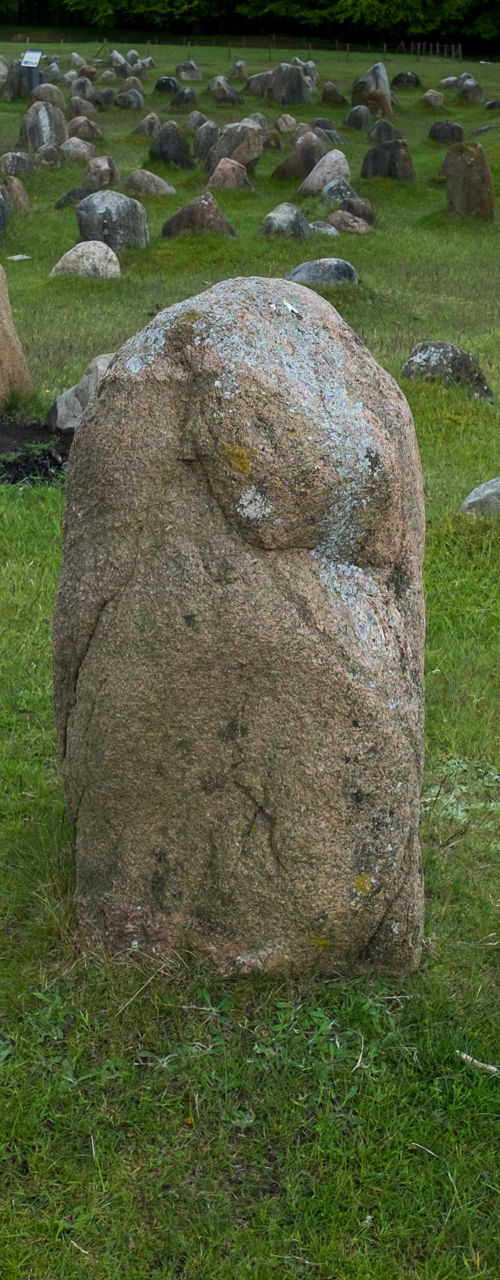 Ancient stone circle in lush landscape