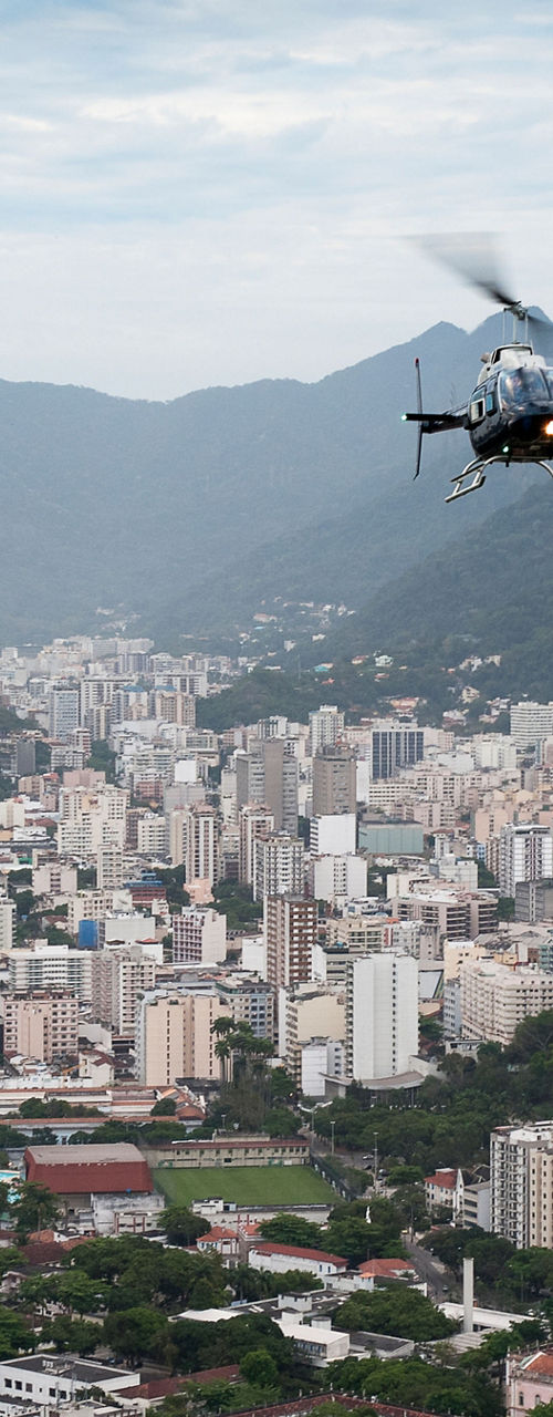 Helicopter flying over Rio de Janeiro skyline