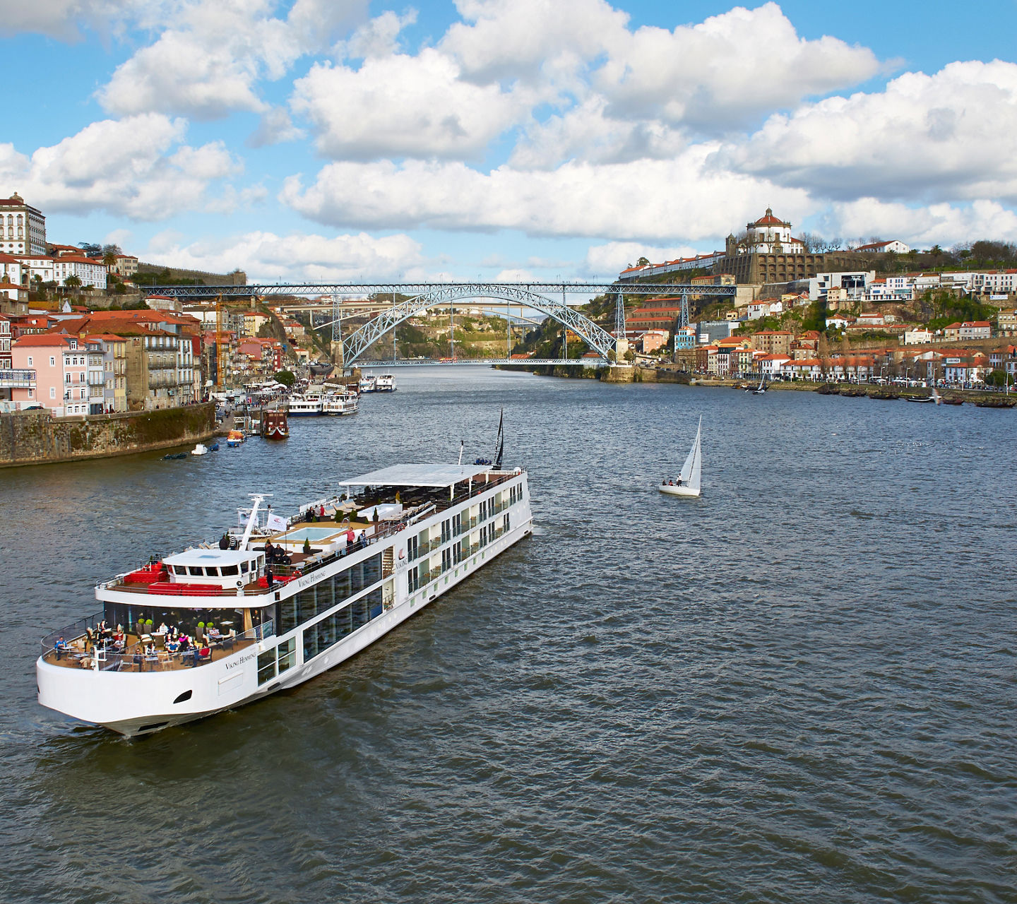 River cruise ship on scenic European waterway