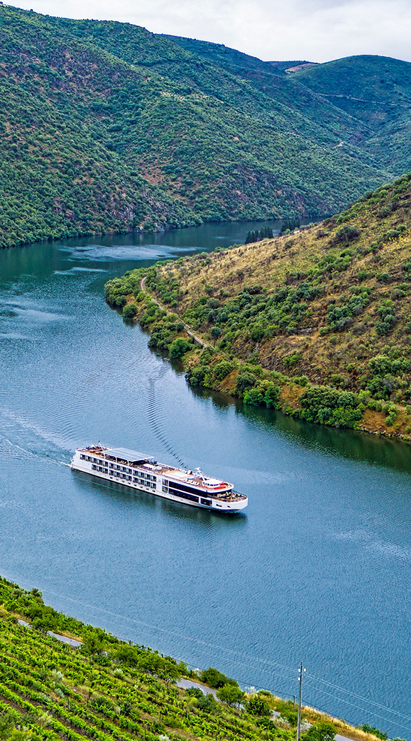 Scenic river cruise through lush valley