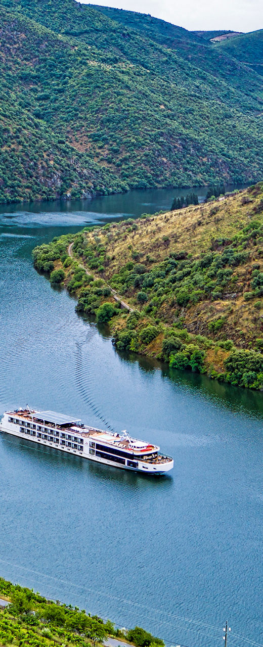 Scenic river cruise through lush valley