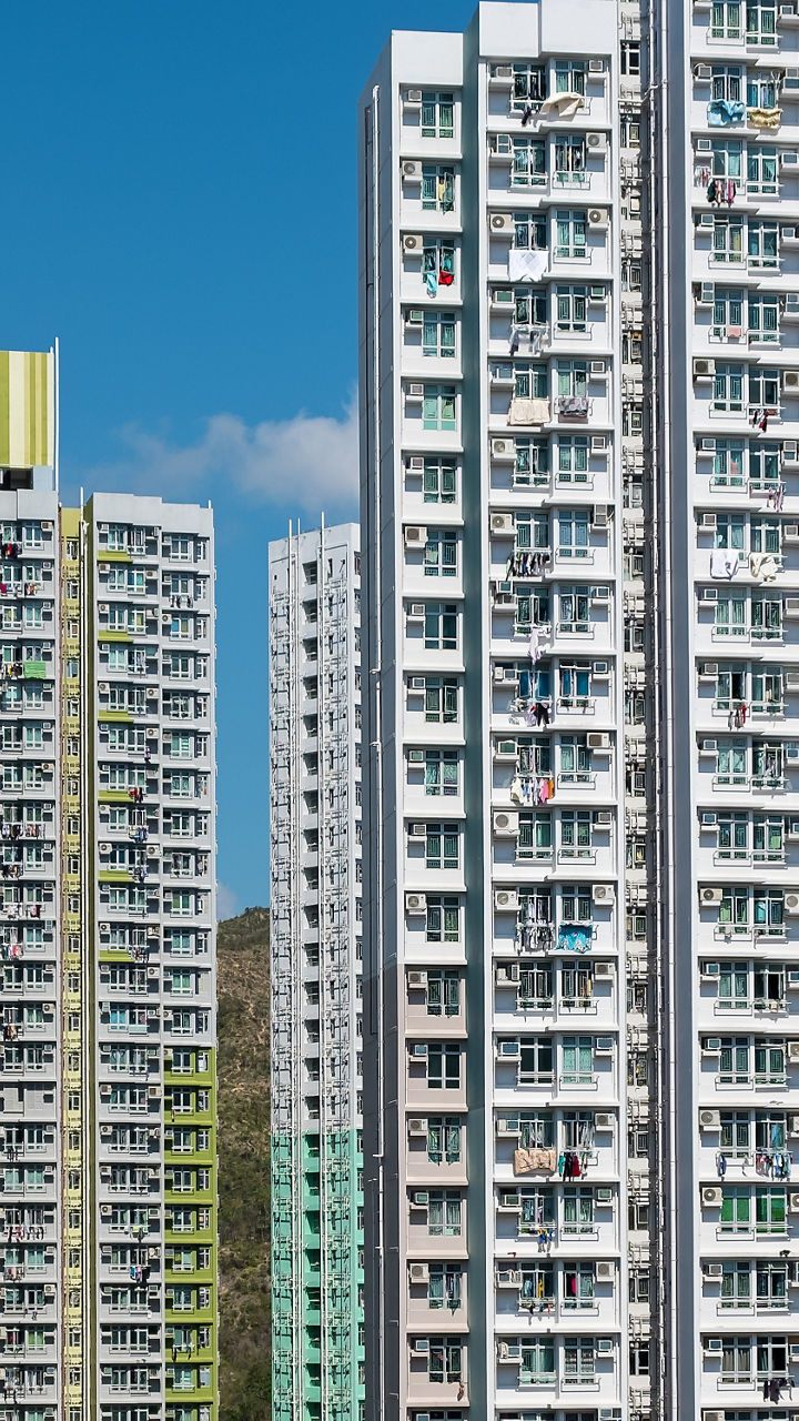 High-rise residential buildings under clear sky