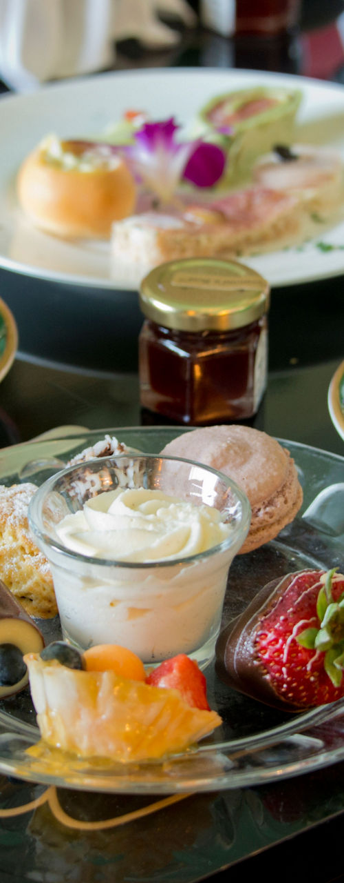Elegant tea service with desserts