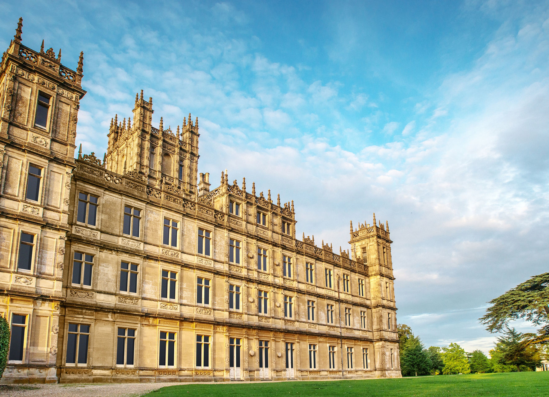 Historic castle with lush green surroundings