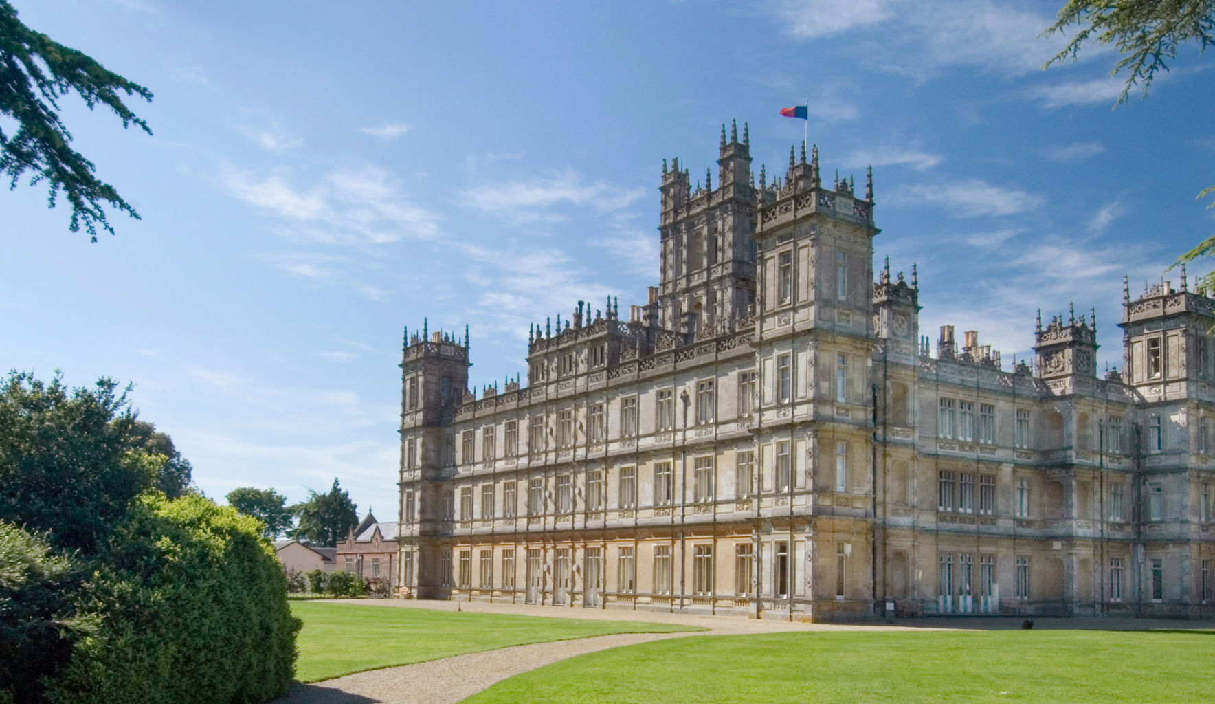 Historic castle with lush green surroundings
