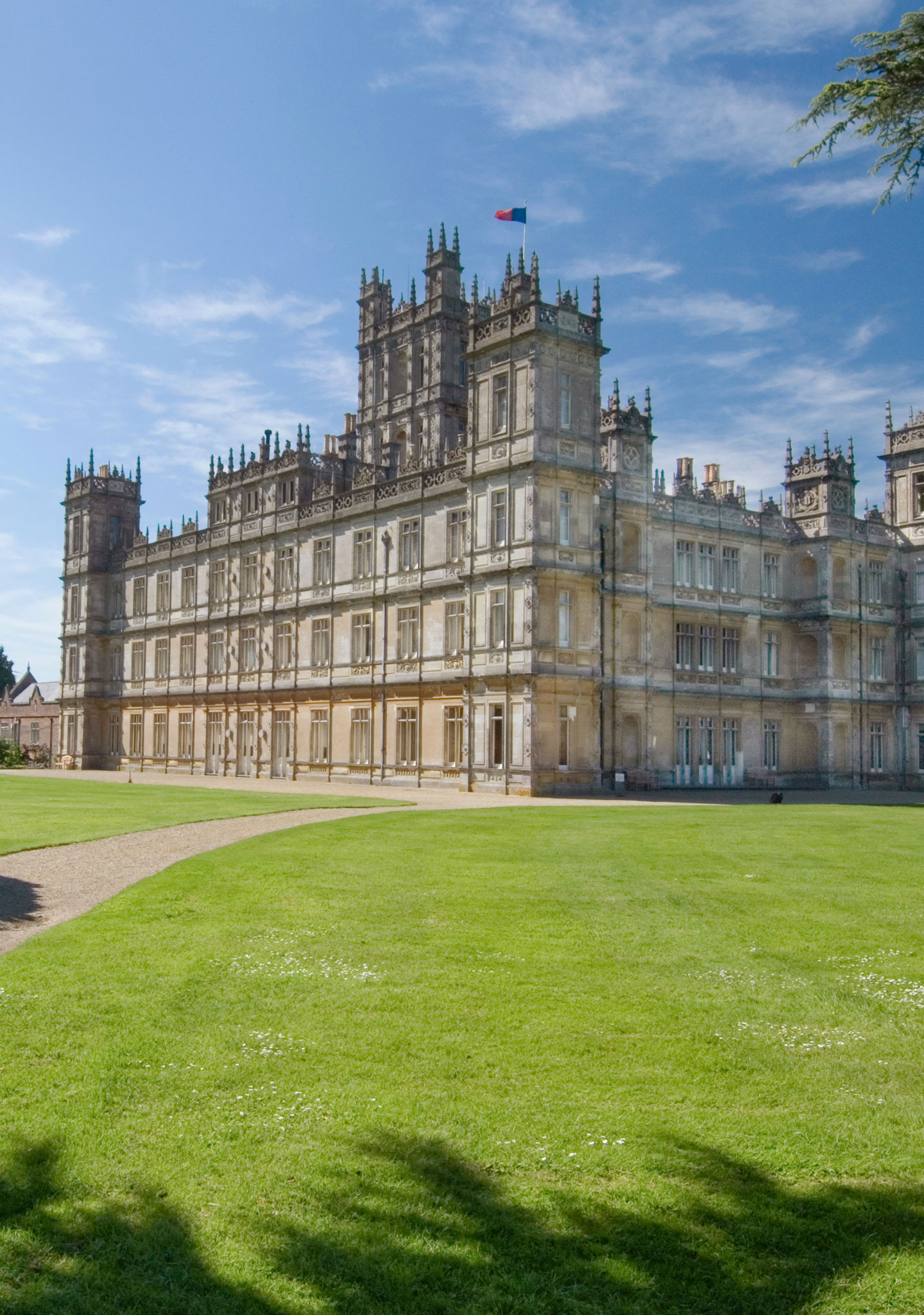 Historic castle with lush green surroundings