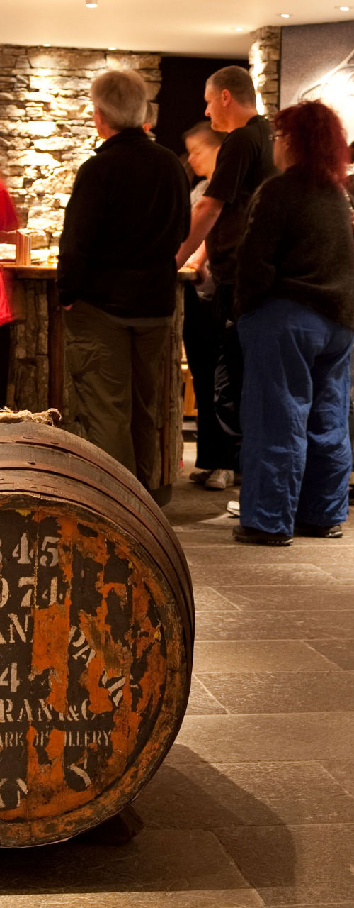 Whiskey tasting room with wooden barrel