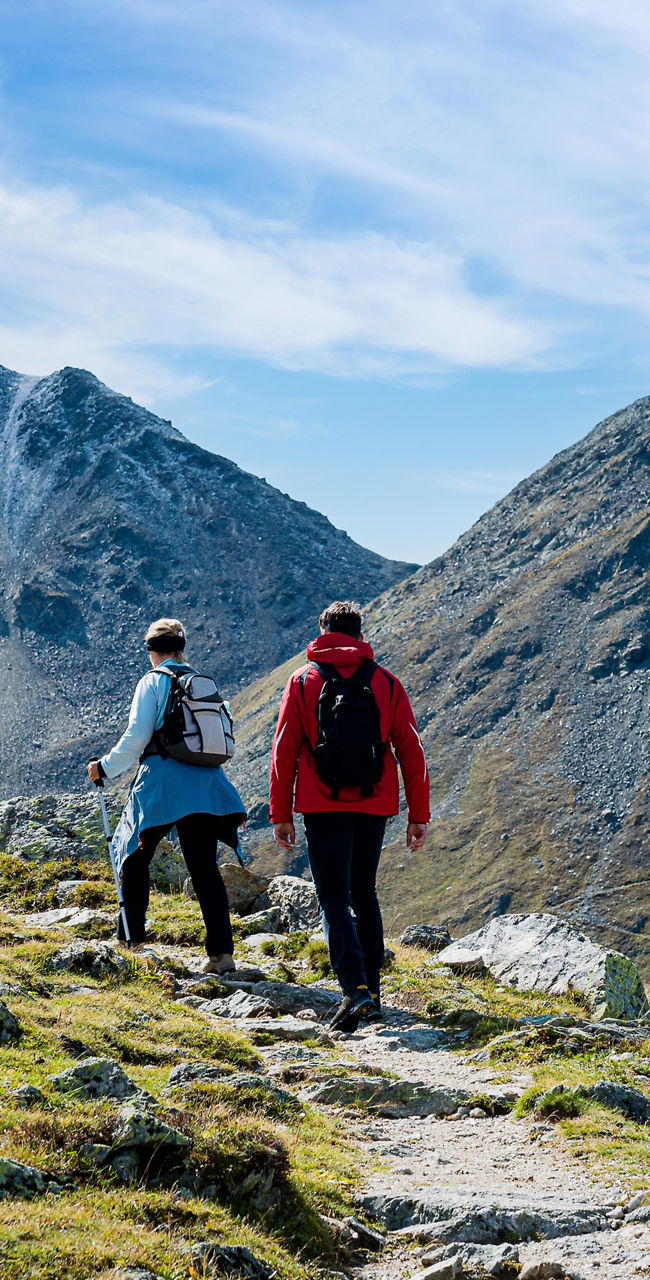 Hikers exploring scenic mountain trail