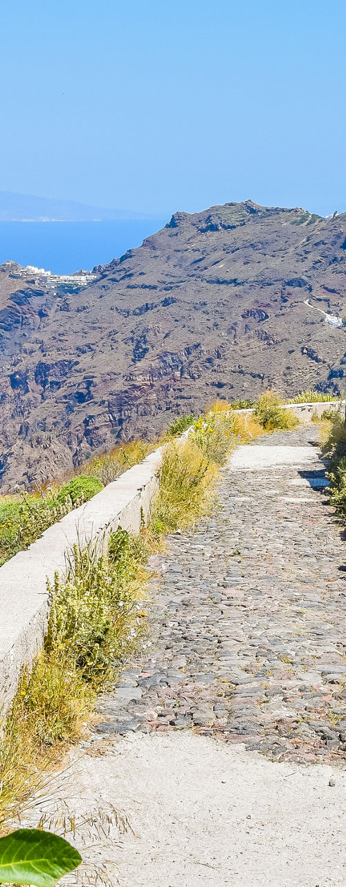 Scenic path overlooking Santorini coastline