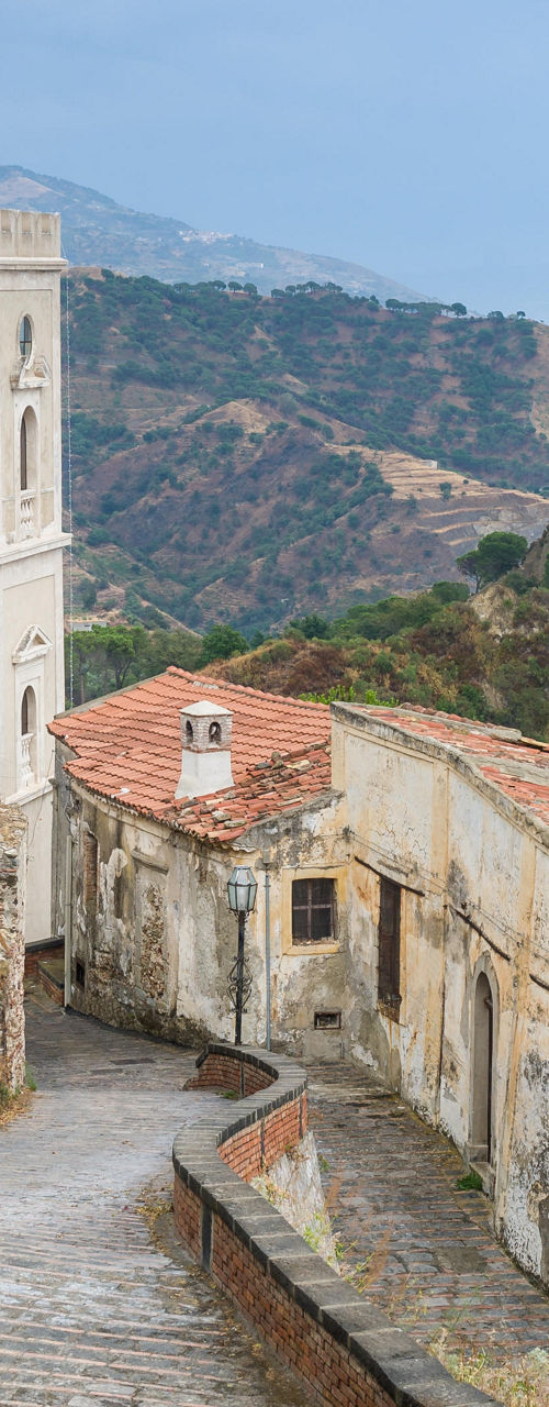 Historic hillside village with stone pathways