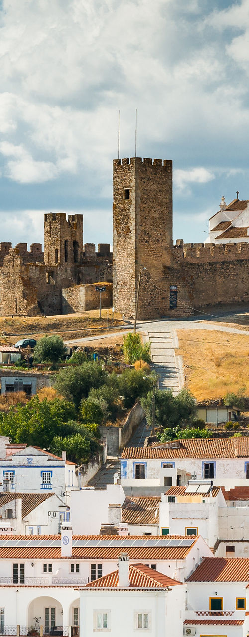 Historic castle overlooking whitewashed village