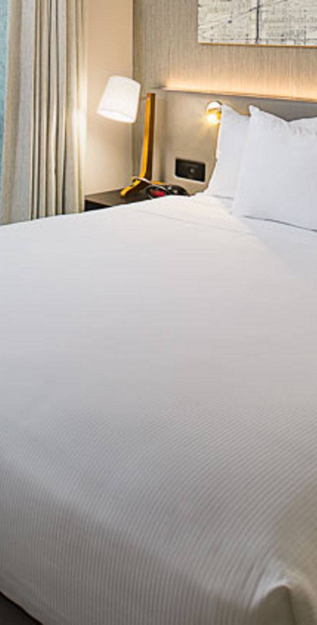 Modern hotel room with city map decor