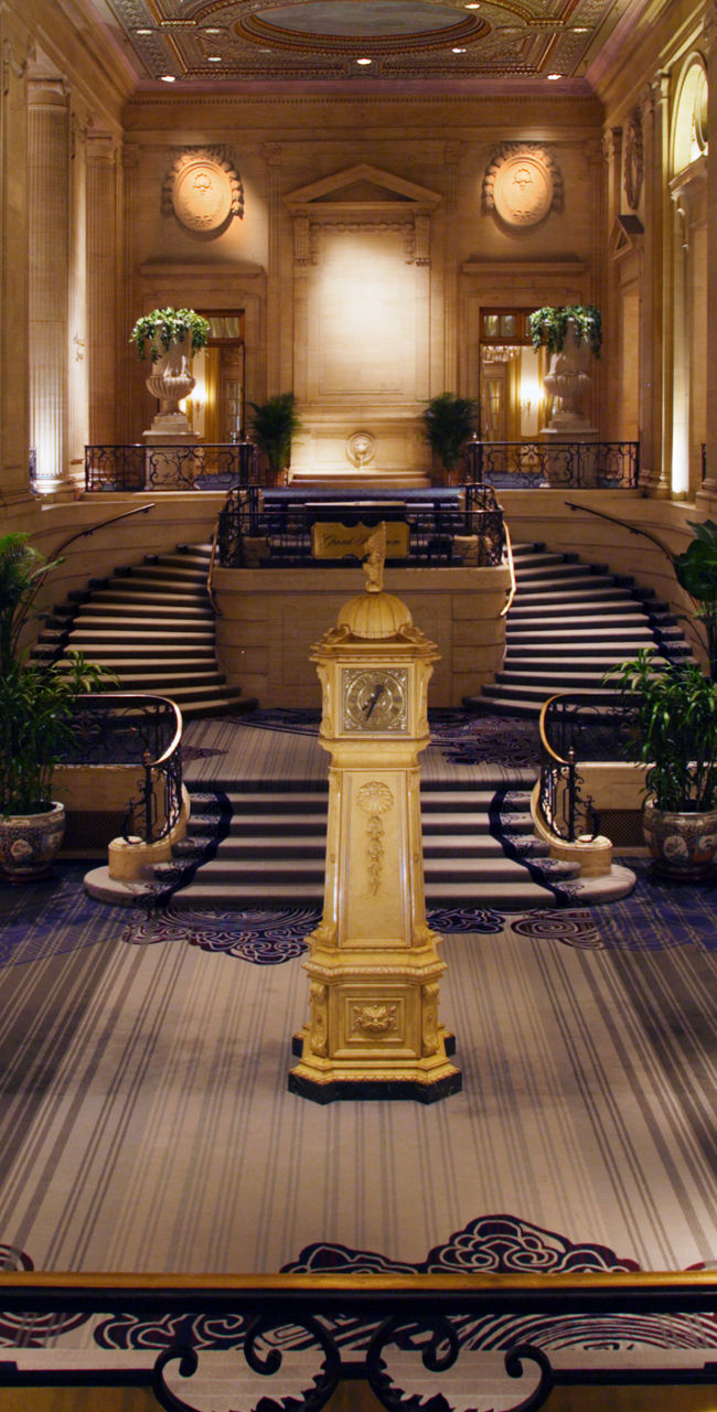 Grand hotel lobby with elegant staircase