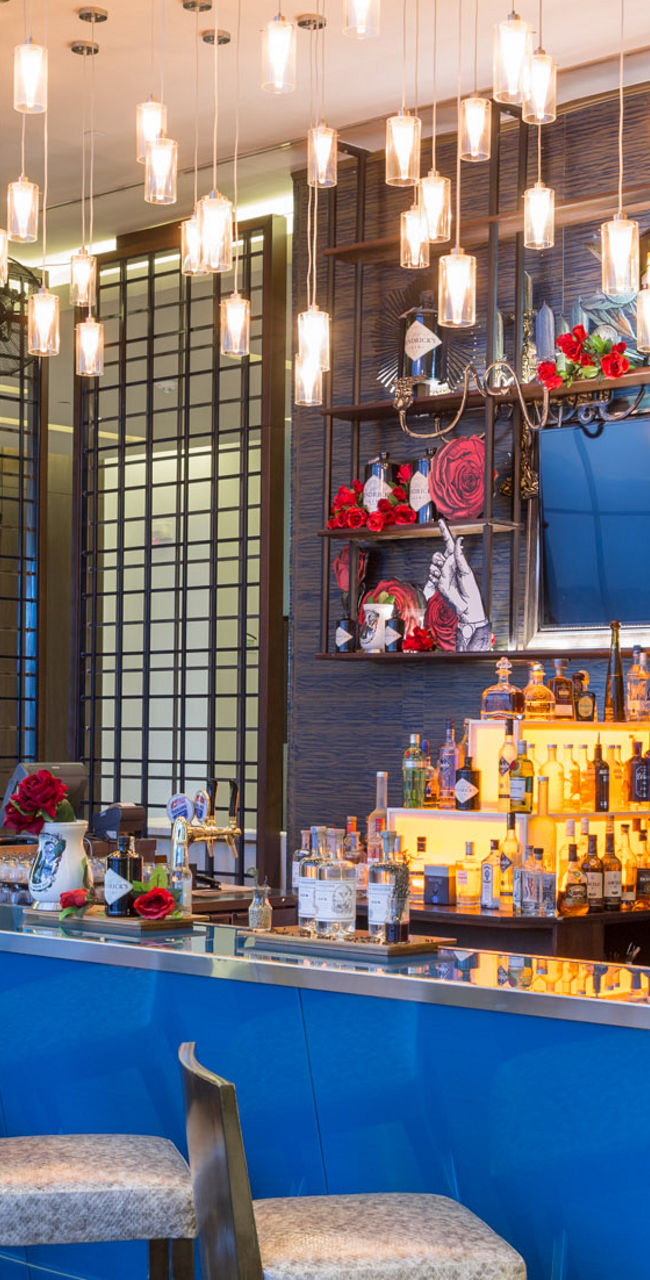 Modern bar with blue counter and lighting