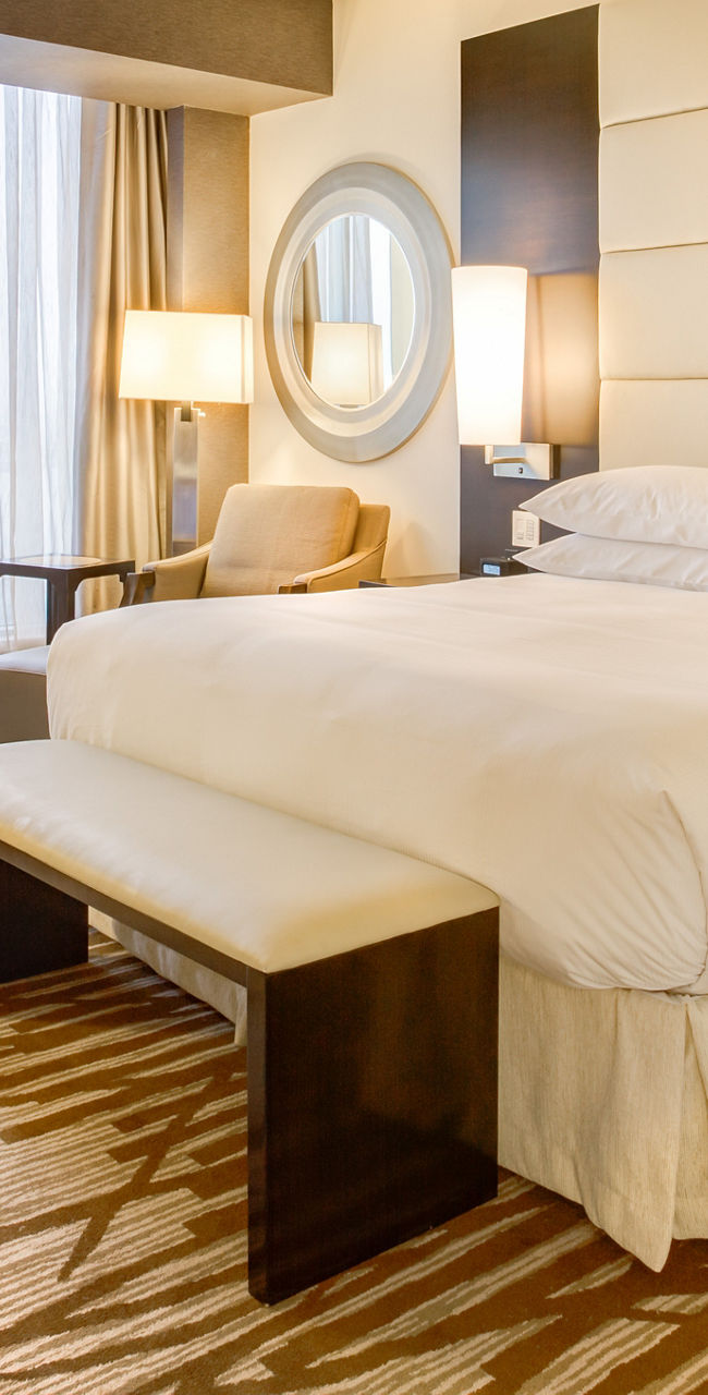 Modern hotel room with waterfront view