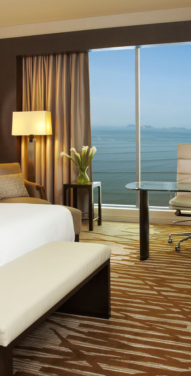 Modern hotel room with ocean view