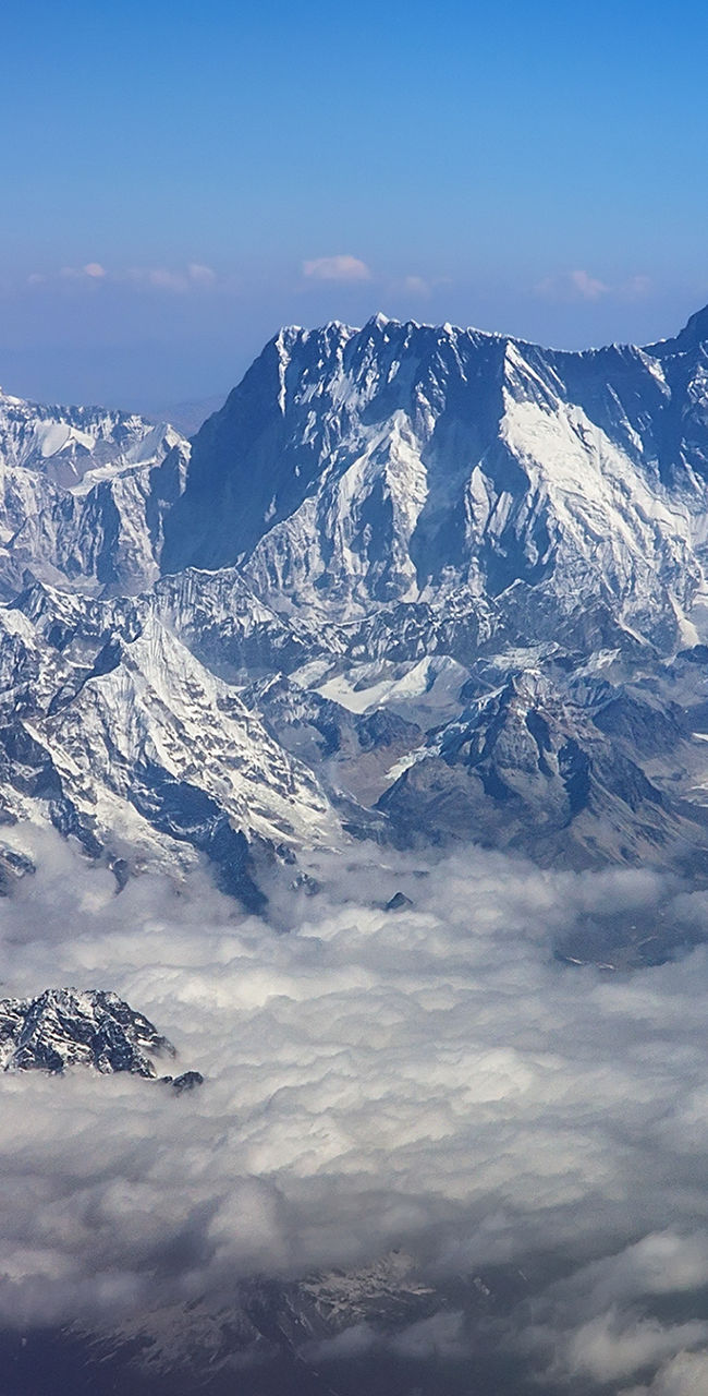 Majestic Himalayan mountain range under clear skies