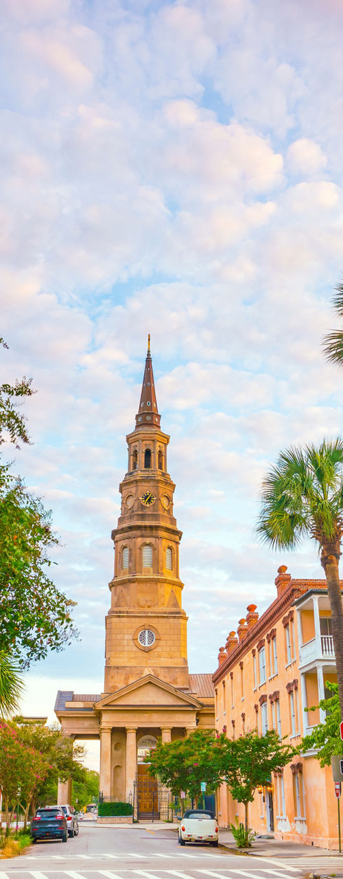 Historic street with church and pastel buildings