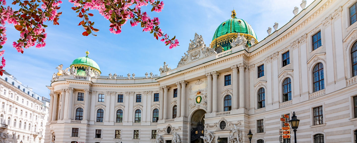 Historic Palace with Horse Carriage Scene