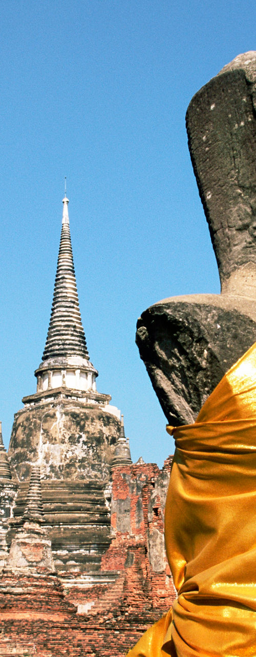 Ancient Buddha statue in historic temple ruins
